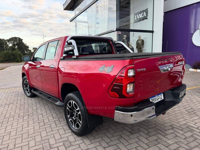 TOYOTA - HILUX - 2020/2021 - Vermelha - R$ 242.900,00