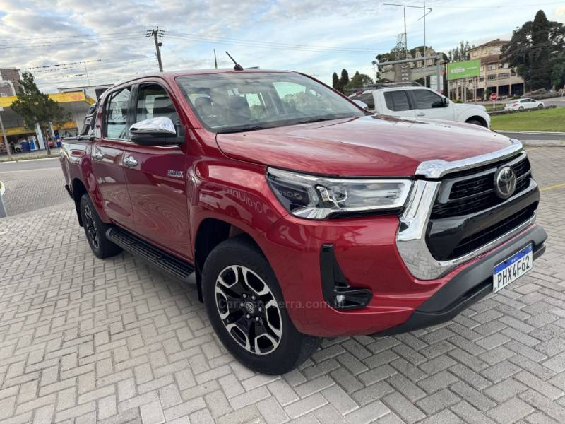 TOYOTA - HILUX - 2020/2021 - Vermelha - R$ 242.900,00