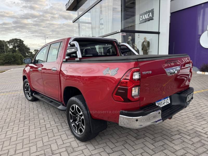TOYOTA - HILUX - 2020/2021 - Vermelha - R$ 242.900,00